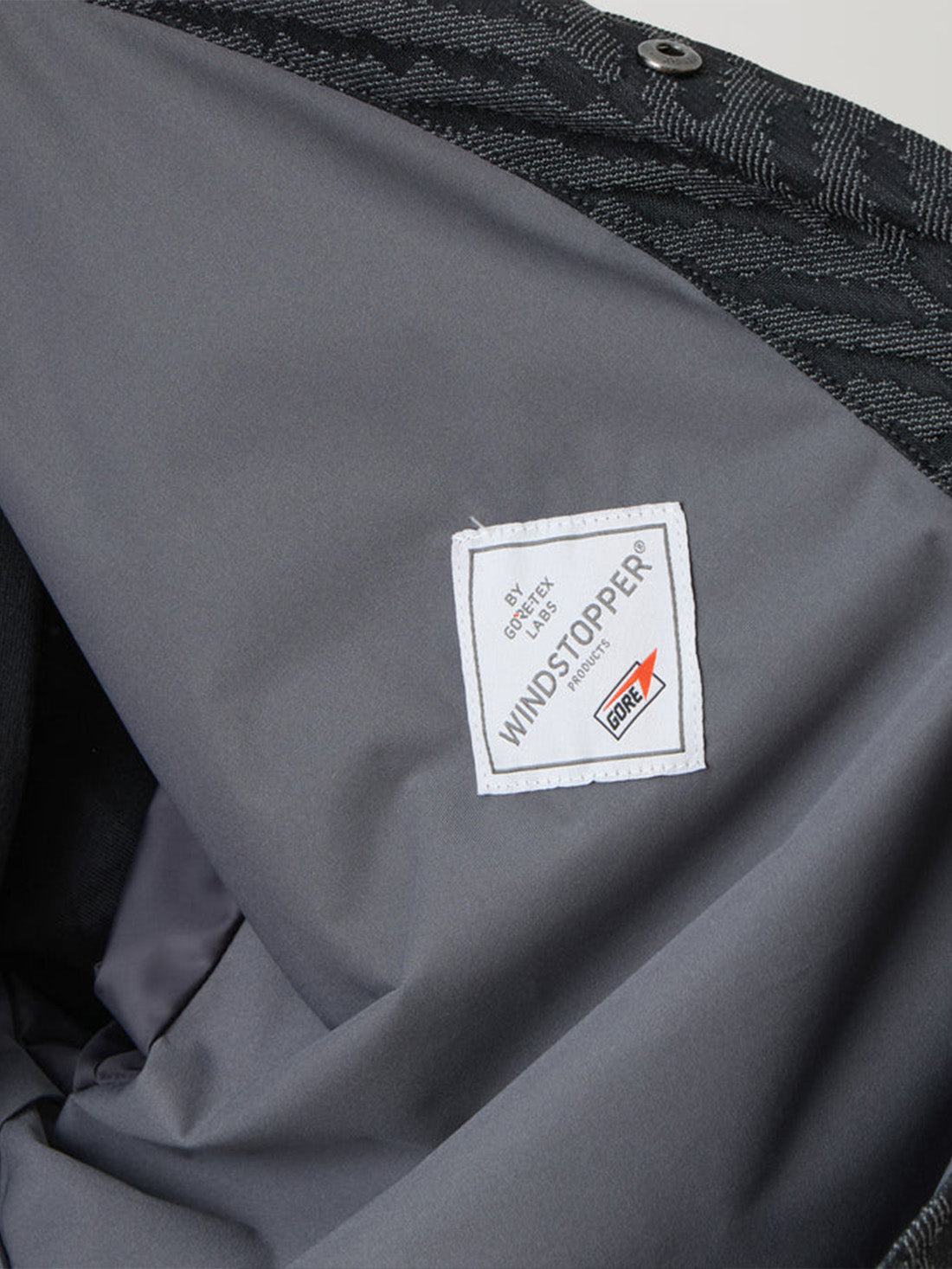 【White Mountaineering - ホワイトマウンテニアリング】WINDSTOPPER HERRINGBONE JACQUARD COACH JACKET / BLACK (ジャケット/ブラック)