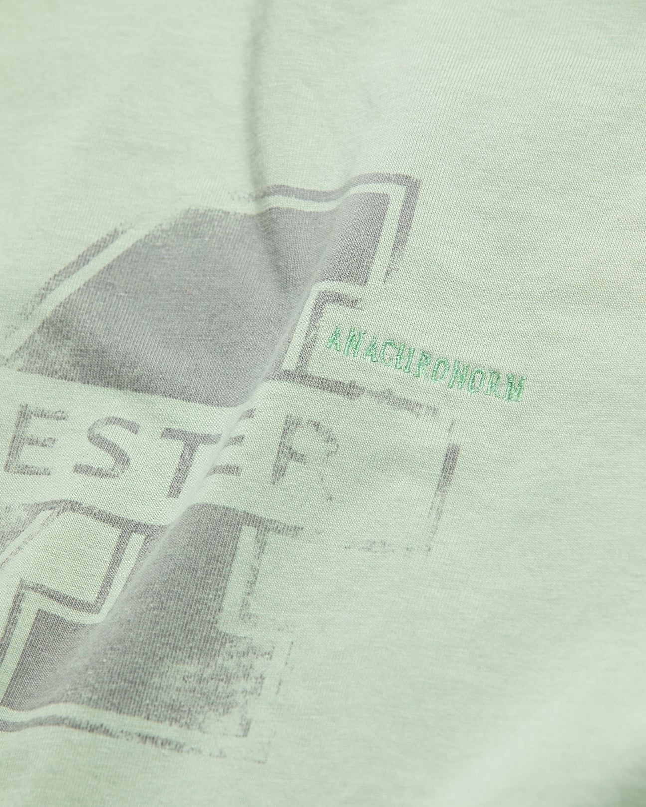 【ANACHRONORM - アナクロノーム】AN368 MANCHESTER PRINTED S/S T-S / SAGE (Tシャツ/セージ)