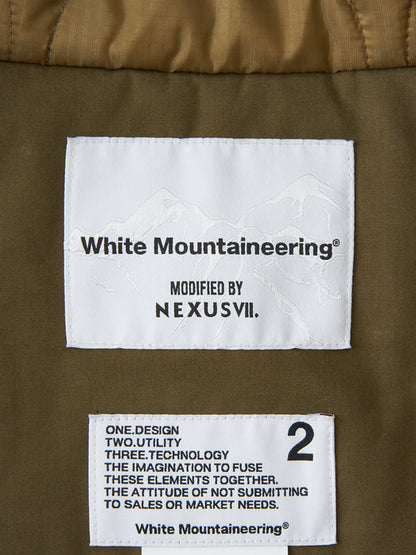 【White Mountaineering × NEXUS VII. - ホワイトマウンテニアリング × ネクサスセブン】ASYMMETRY JACKET / KHAKI(ジャケット/カーキ)