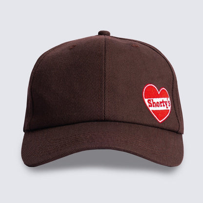 【PLEASURES - プレジャーズ】HEART SNAPBACK / BROWN (キャップ/ブラウン)