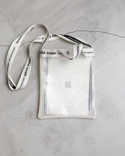【beautiful people - ビューティフルピープル】Vinyl logo tape Sacoche bag / CLEAR（バッグ/クリア)